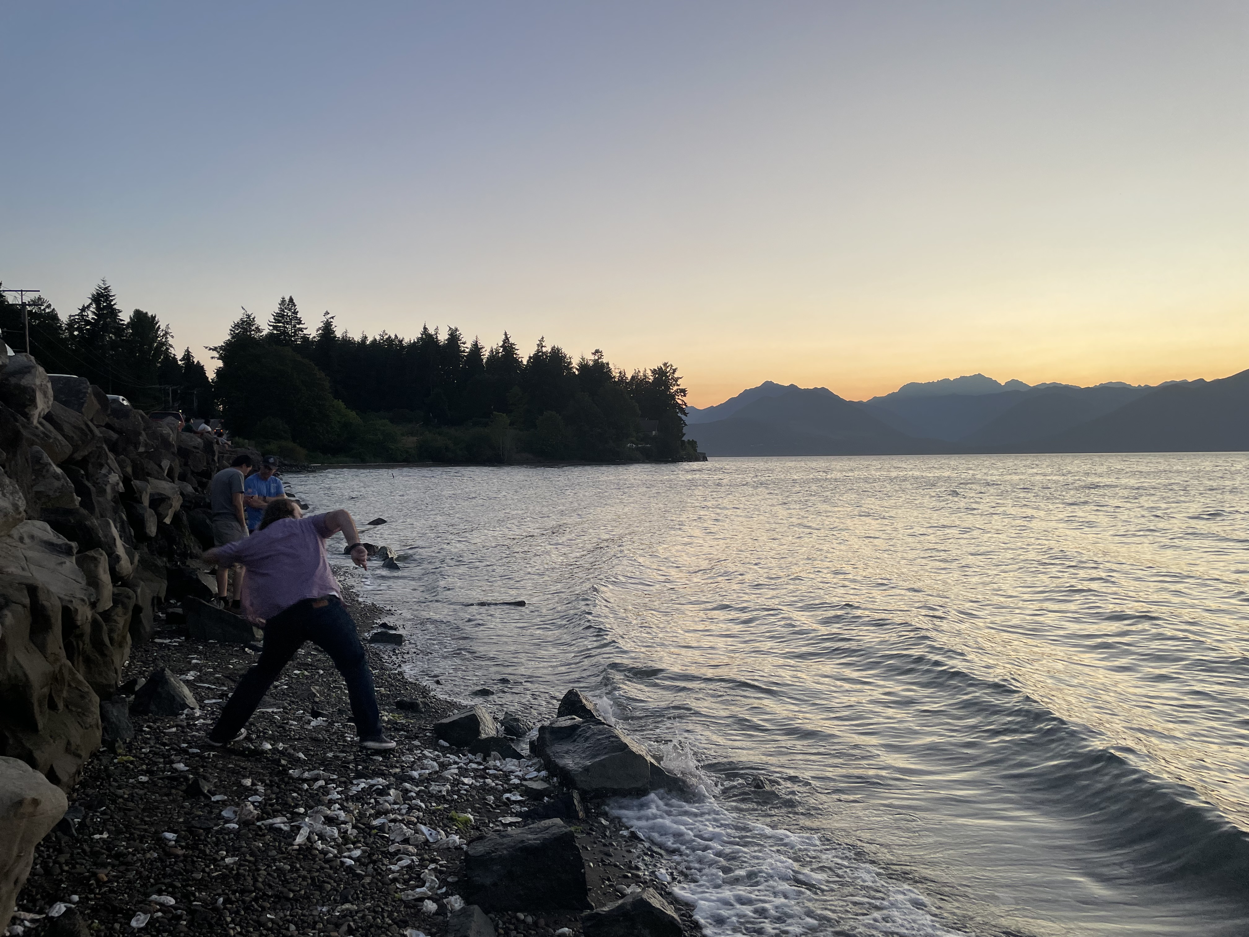Nathan skipping rocks in Bremerton